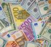 Moneda națională câştigă teren în raport cu euro, dar se depreciază în faţa dolarului american